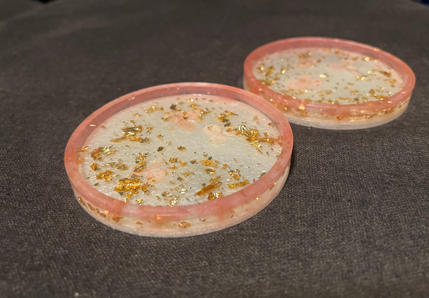 Pink and gold coaster pair